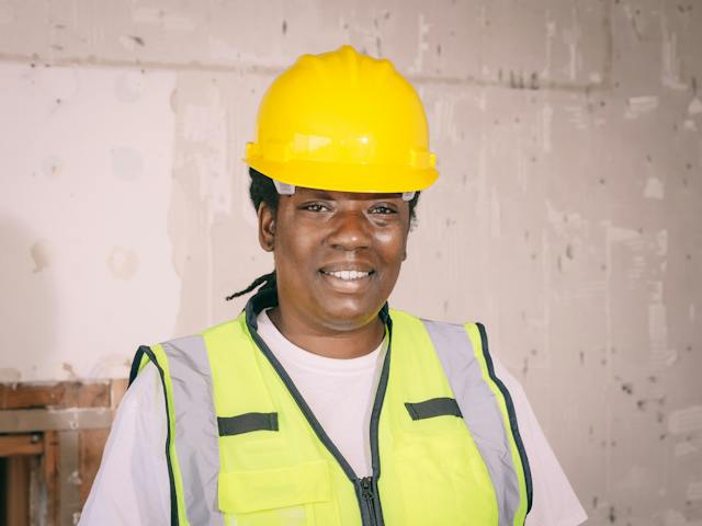A contractor looking at the camera and smiling.