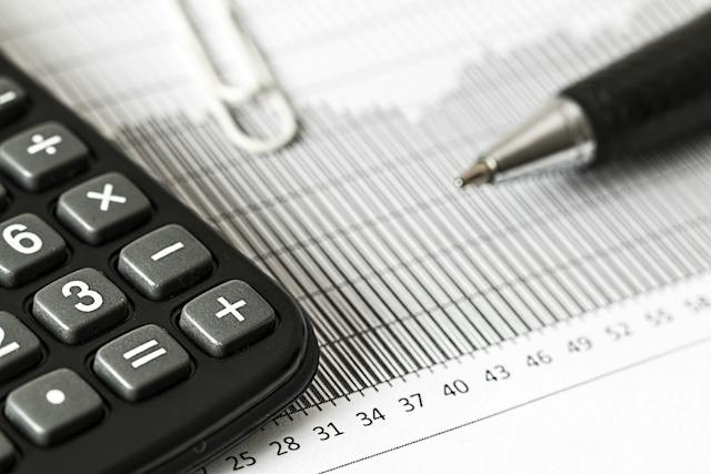 A pen and a calculator.